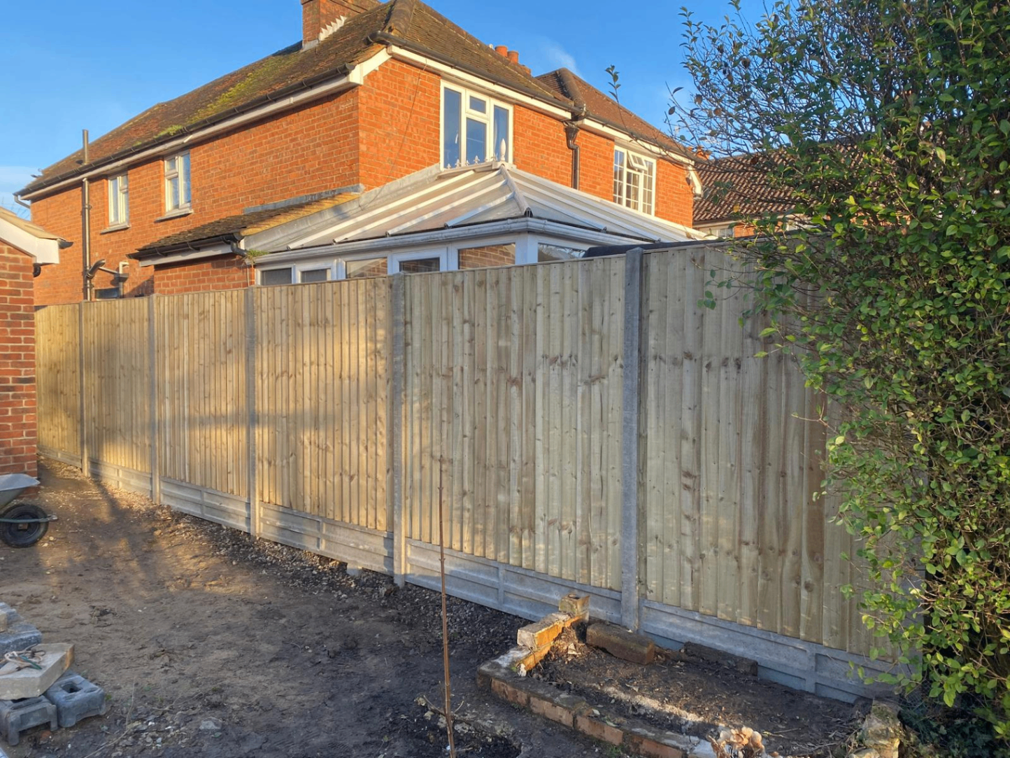 Real closeboard fence installation in Weybridge