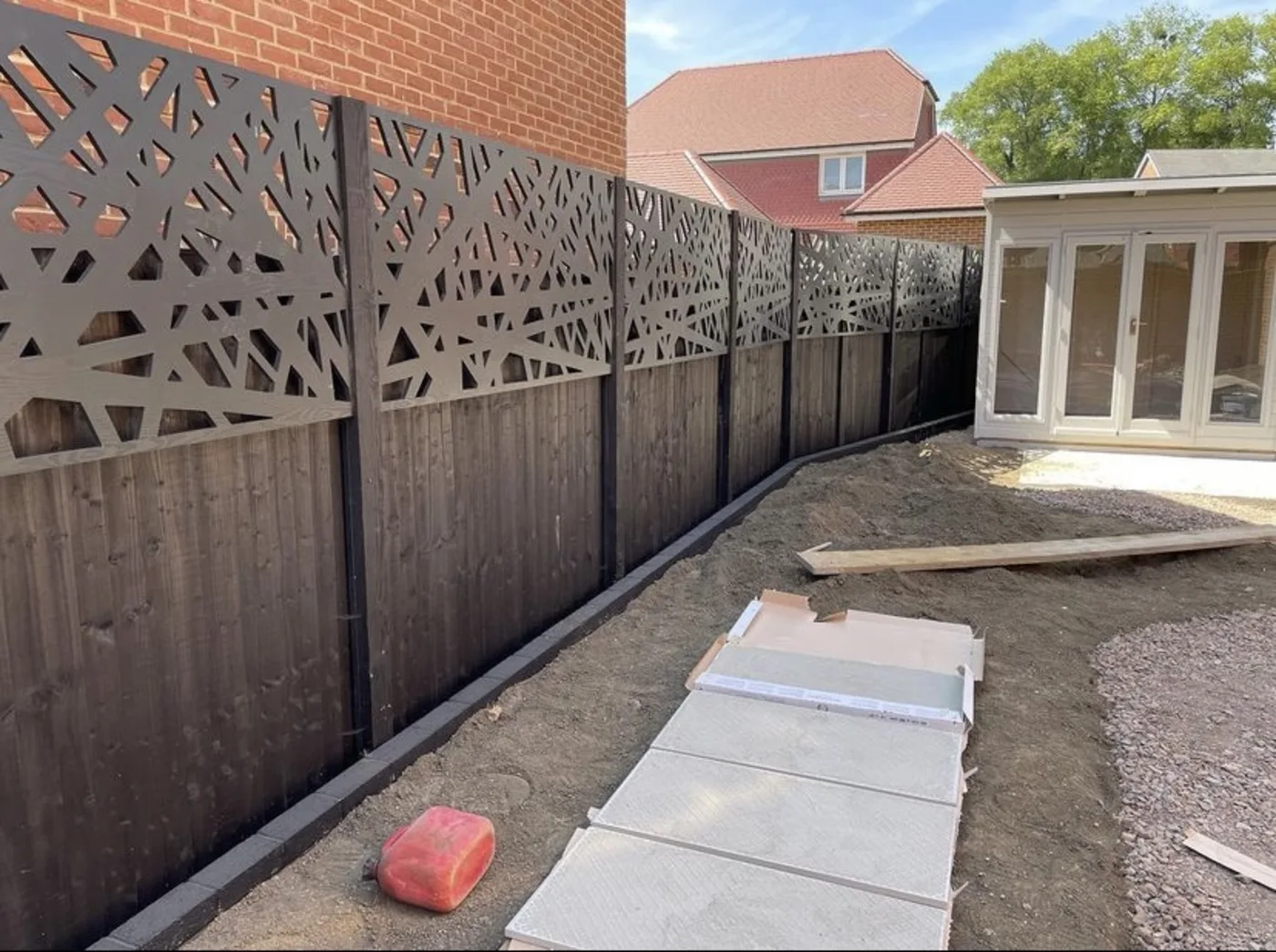 Long run of fence panels with concrete posts